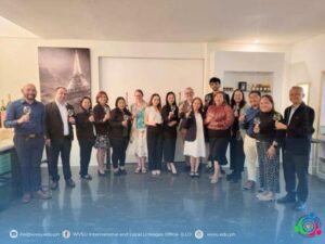 group of people standing and smiling for a picture